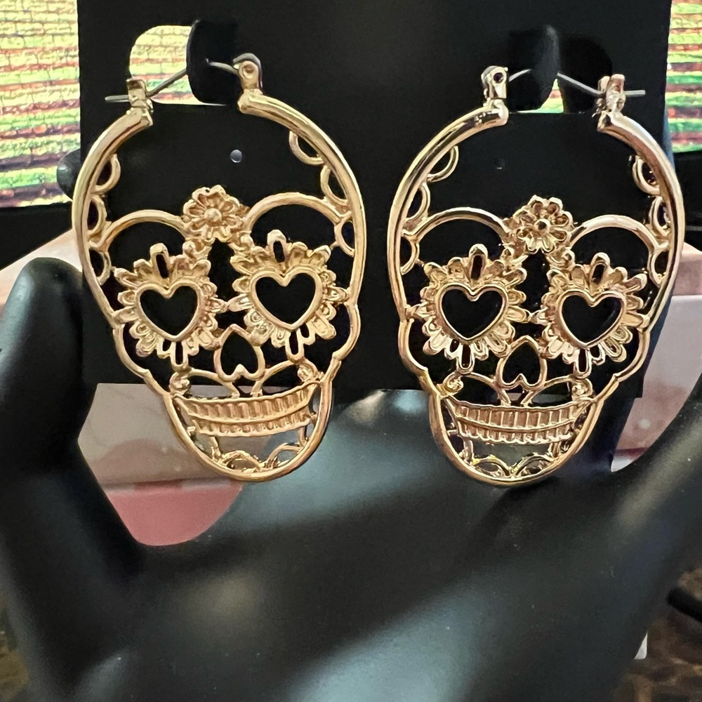 Brand New Beautiful Skeleton Earrings by Guess